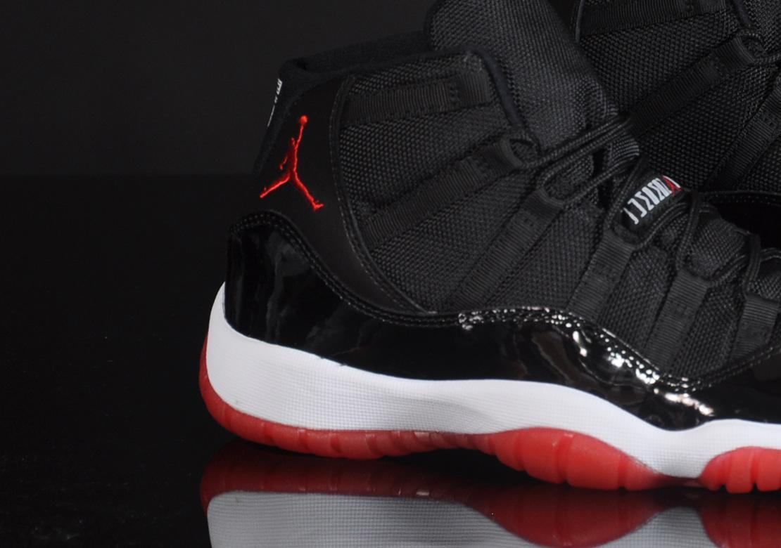 Jordan 11 high top black and red hotsell